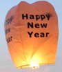 Flammea latajace zyczenia Szczesliwego Nowego Roku
